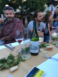 people at table drinking wine
